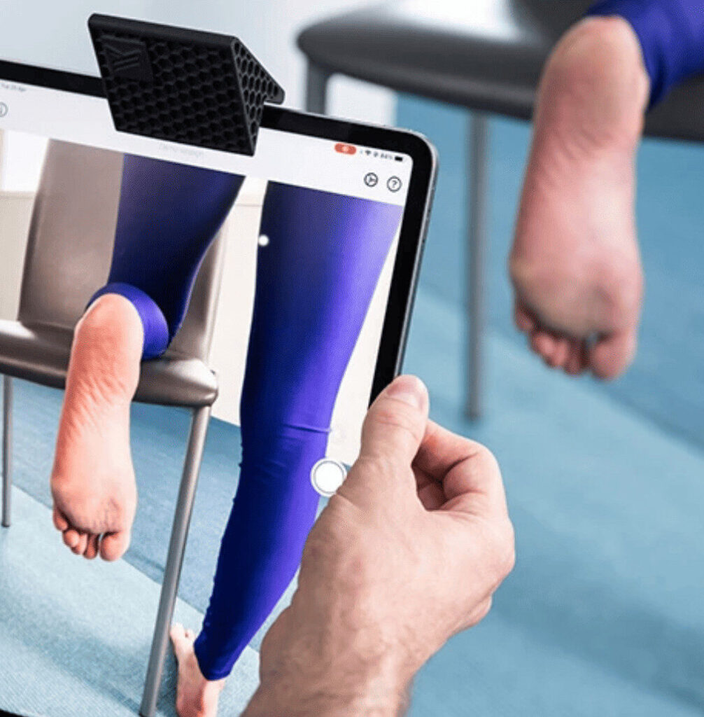 A podiatrist in Adelaide using a digital scan to design some custom orthotics