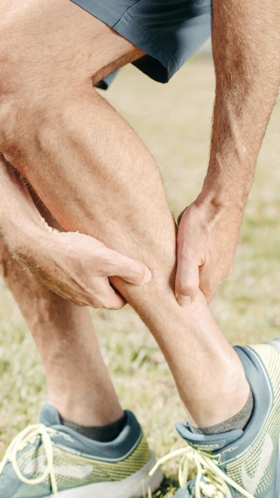 pexels-kindelmedia-7298421 A podiatrist in Adelaide examining an athlete’s foot for signs of overuse injury
